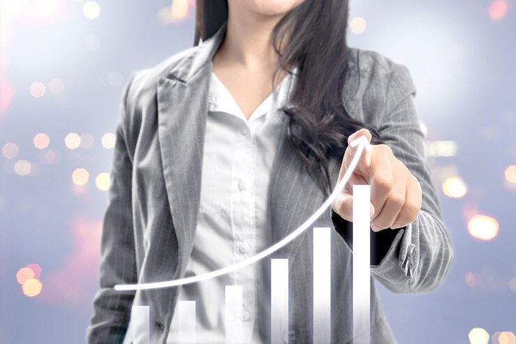 business-woman-with-fingers-drawing-growing-3d-bar-graph-virtual-screen_9083-2950